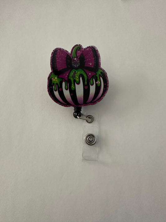Scary Purple Bow Pumpkin Badge Reel